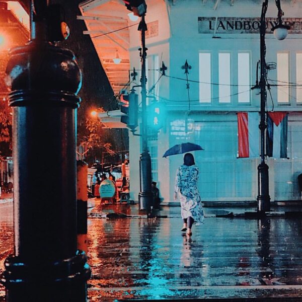 Intersection always come side by side, one side is a warm full of crowd, while o...