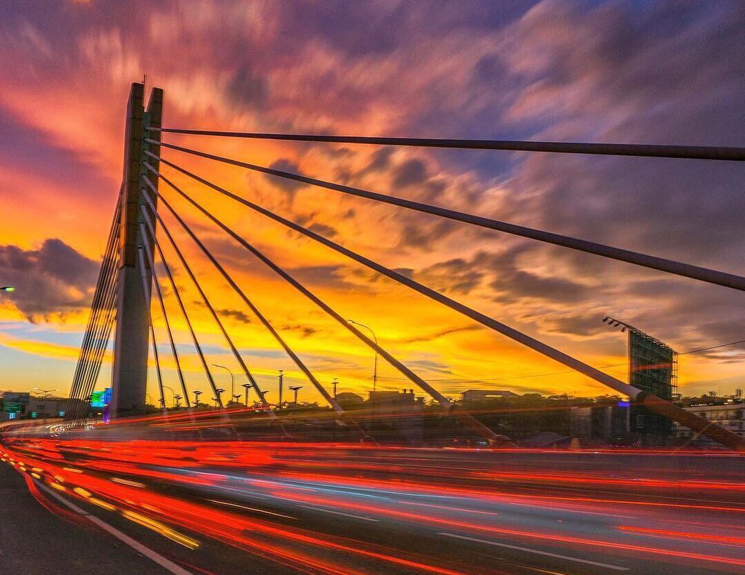 A flicker of a blazing sunset peeks through the Pasupati bridge. Captured by 
#e...