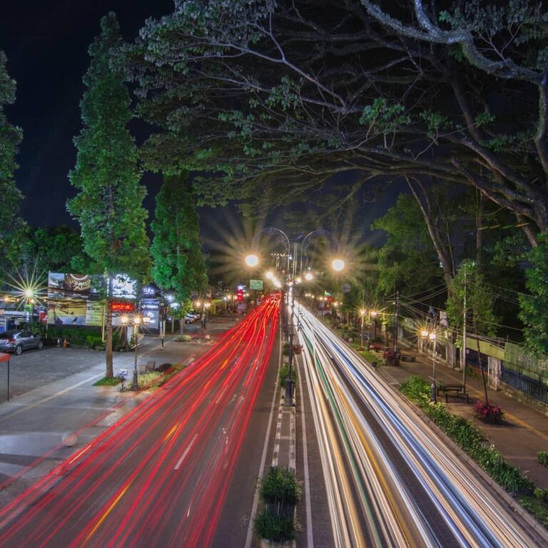 Blazing lights from fast-pacing vehicles on the street of Dago. Make sure to alw...