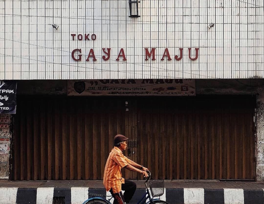 A cyclist passes shopping complex at A. Yani Street. #exploresukabumi photo by ...