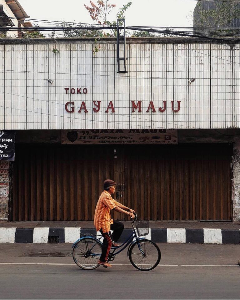 A cyclist passes shopping complex at A. Yani Street. #exploresukabumi photo by ...