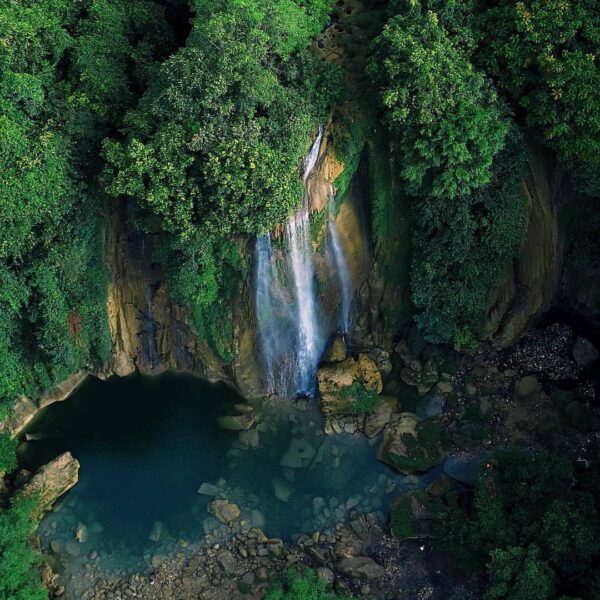 Can you spot a tiny little man? Bird-eye view above Cikaso Fall by  #exploresuka...