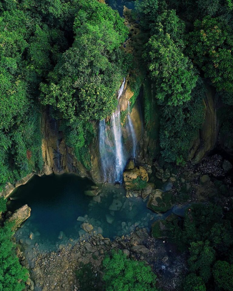 Can you spot a tiny little man? Bird-eye view above Cikaso Fall by  #exploresuka...