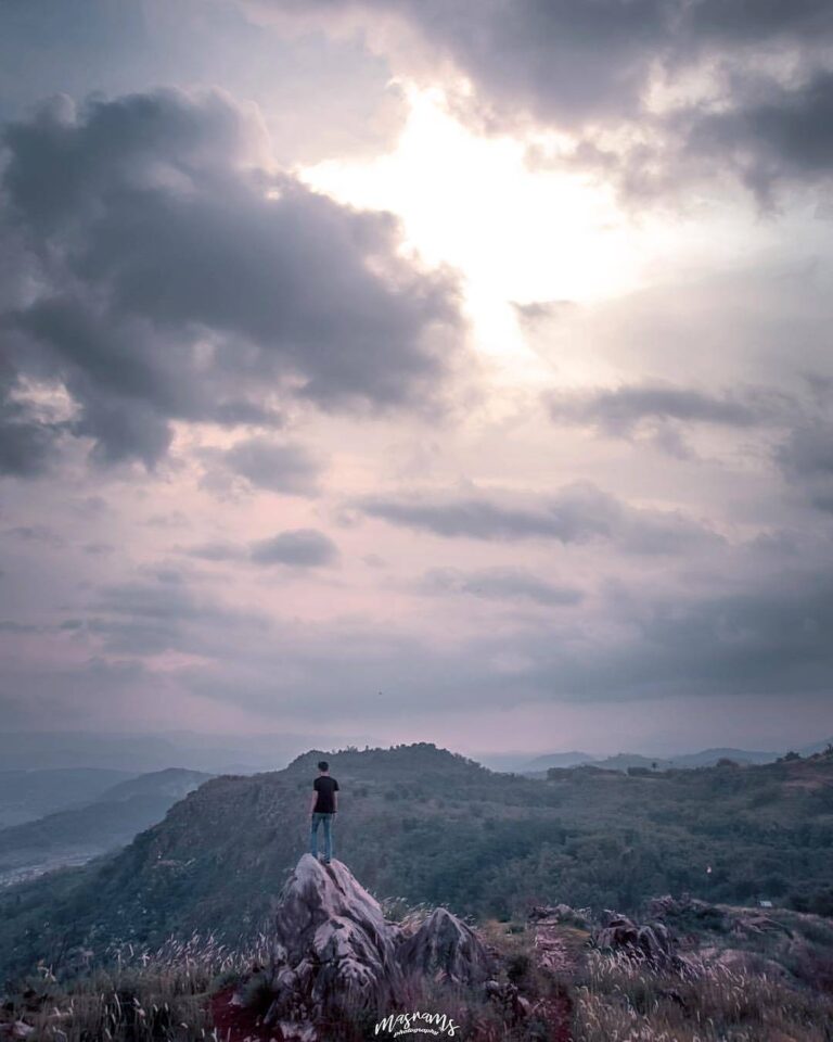In this picture,  shows his mood when visiting Gunung Karang Numpang; nothing cl...
