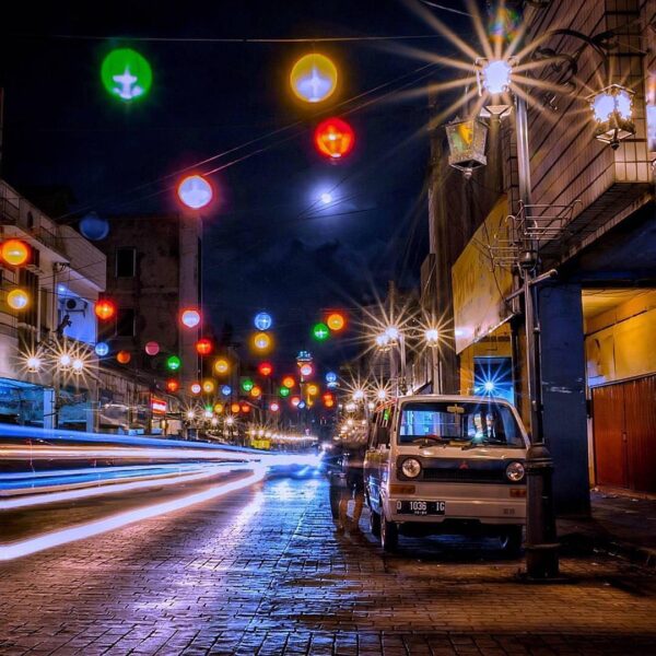 Colorful lantern hanging above Cibadak street makes the night looks merrier. Cap...