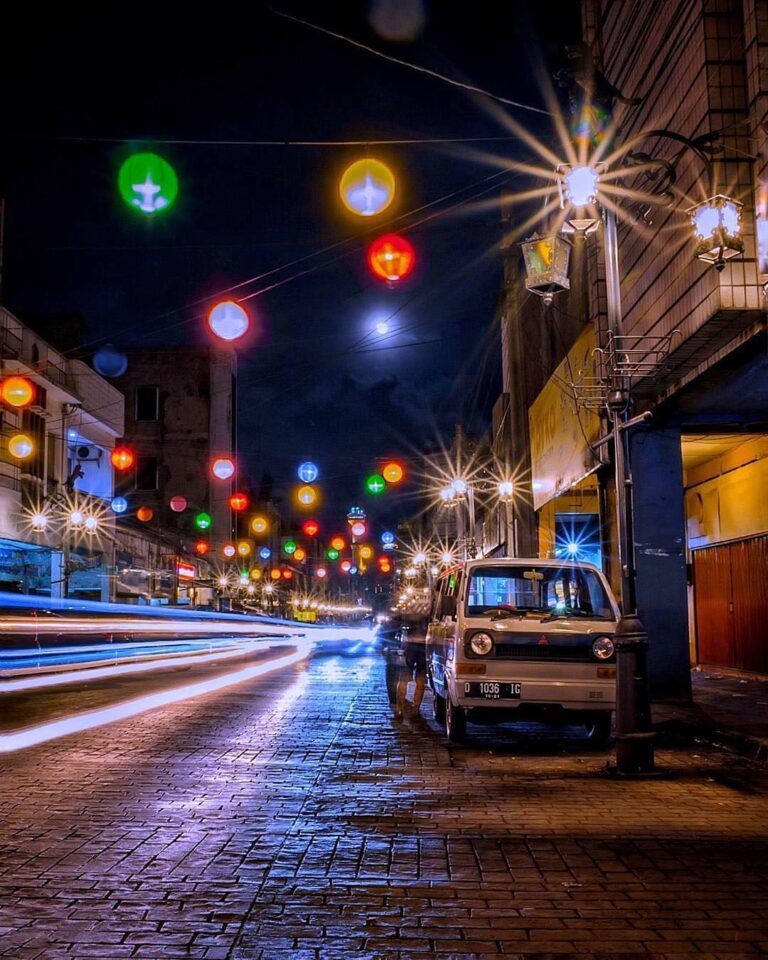 Colorful lantern hanging above Cibadak street makes the night looks merrier. Cap...