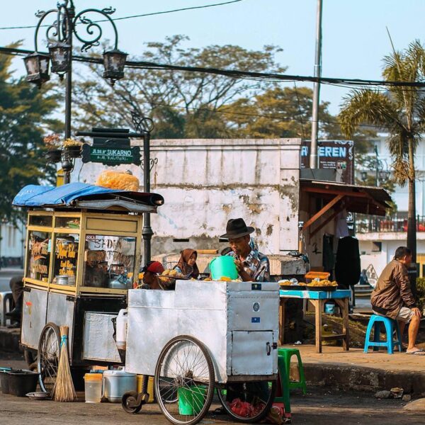 Street food seller on Sukarno Street captured by  What kind of street food is yo...